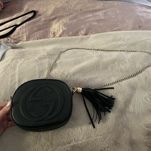 Black bag with tassel and gold chain